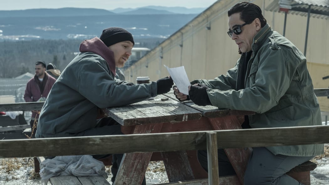 Paul Dano and Benicio del Toro inside the real Clinton Correctional Facility with the Adirondacks in the background.