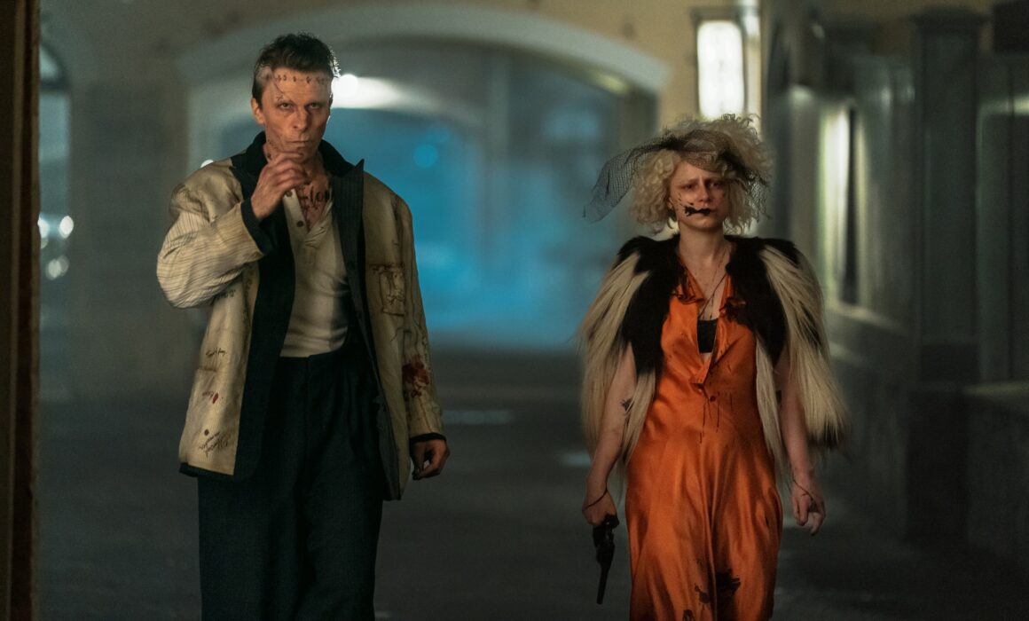 Copyright: © 2026 Warner Bros. Ent. All Rights Reserved
Photo Credit: Photo by Niko Tavernise
Caption: (L to r) Chrisitan Bale as Frank and Jessie Buckley as The Bride in Warner Bros. Pictures THE BRIDE! A Warner Bros. Pictures release.